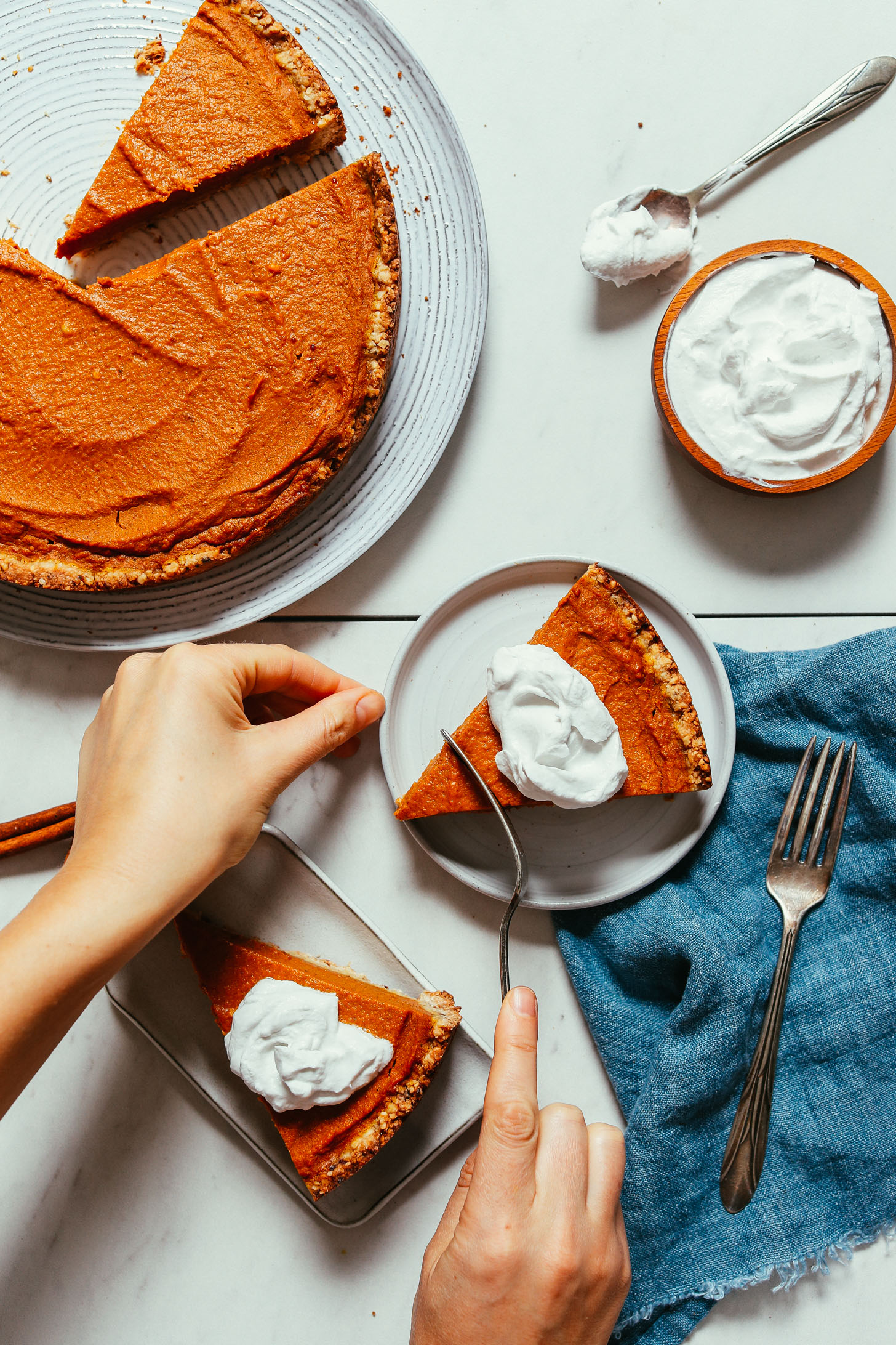Using a fork to bite into a slice of 1-Bowl Pumpkin Pie