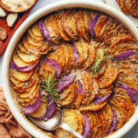 Baking dish filled with our vegan potato gratin recipe