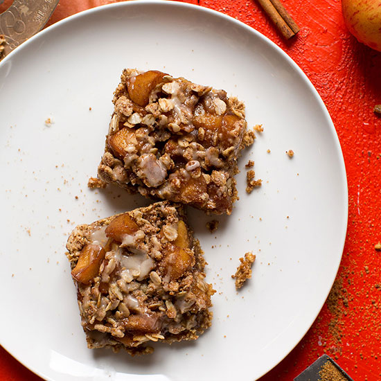 Two Gluten-Free Vegan Apple Pie Crumble Bars on a large plate