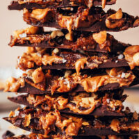 Stack of pieces of caramel peanut butter chocolate bark