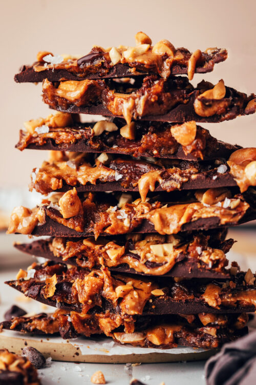 Stack of pieces of caramel peanut butter chocolate bark