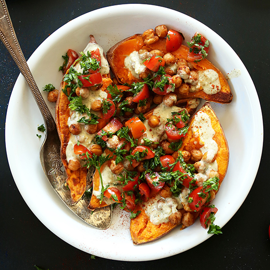 Bowl of Mediterranean Baked Sweet Potatoes for a simple and healthy vegan meal