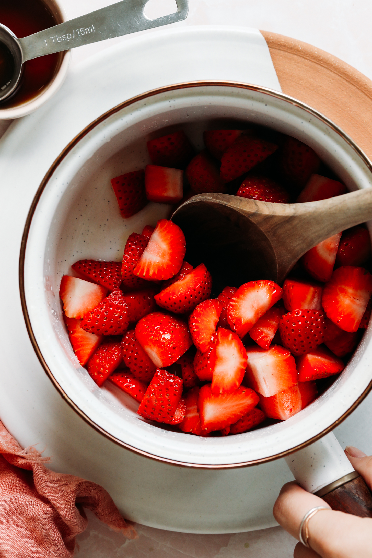 Sliced strawberries in a saucepan