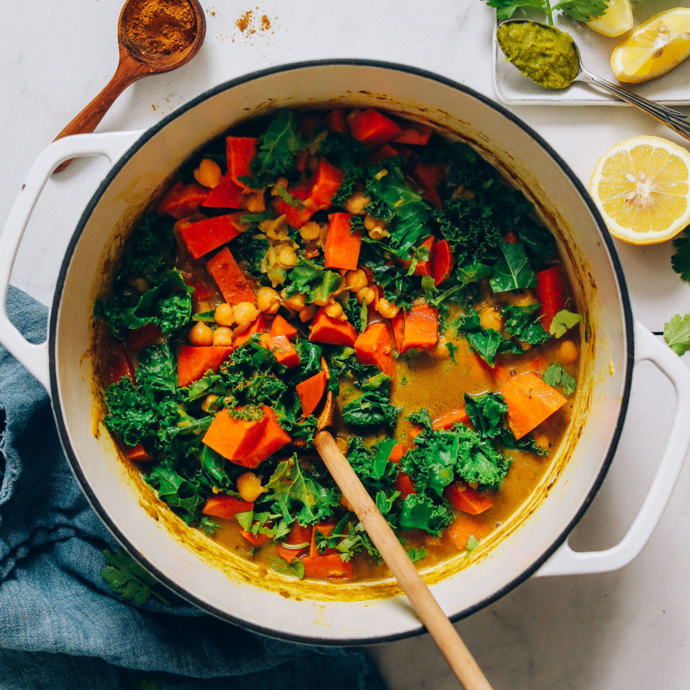 Dutch oven filled with Chickpea Sweet Potato Kale Green Curry