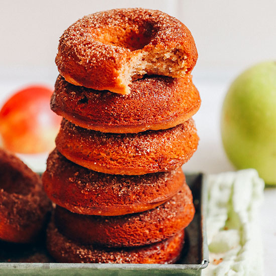 Tray with a stack of Vegan Gluten-Free Apple Cider Donuts